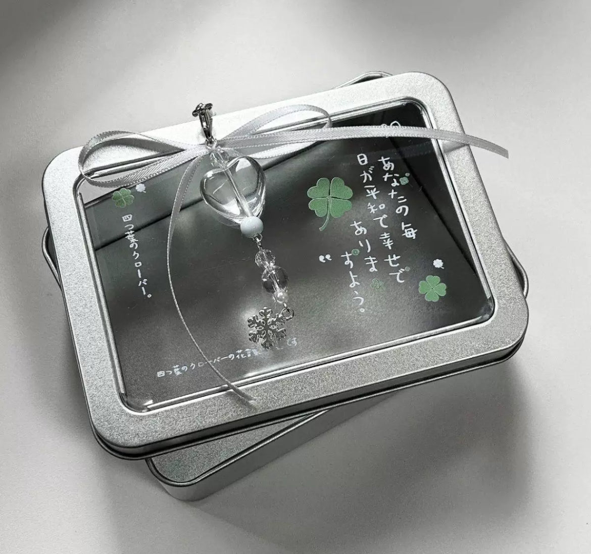 ins Japanese style four-leaf clover girl's heart bedroom silver iron box high value small card storage box open window visible